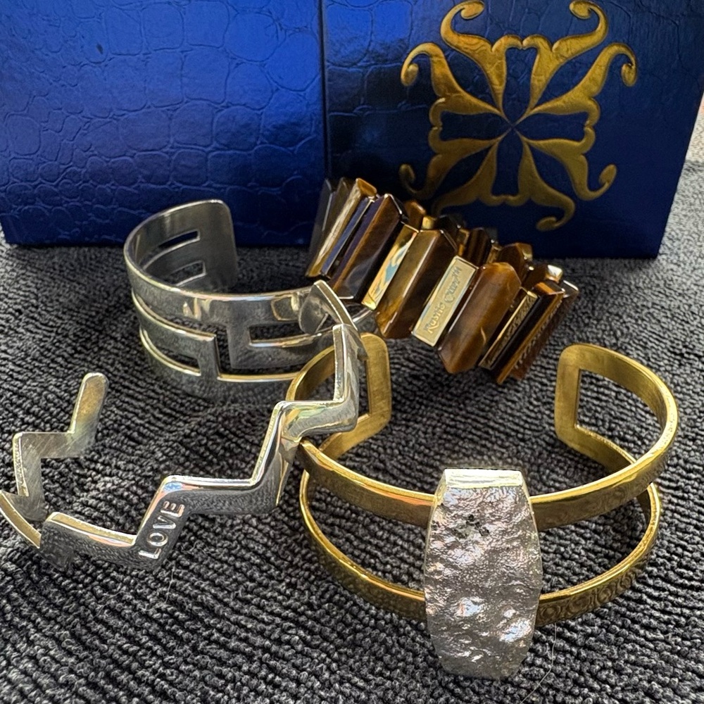 Group of Four Silver and Gold Rustic Cuff Bracelets